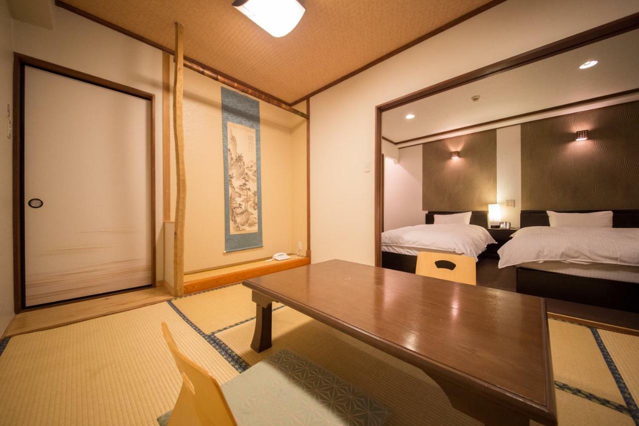 료칸 여명 旅館 黎明 Ryokan Reimei Юфу Екстер'єр фото
